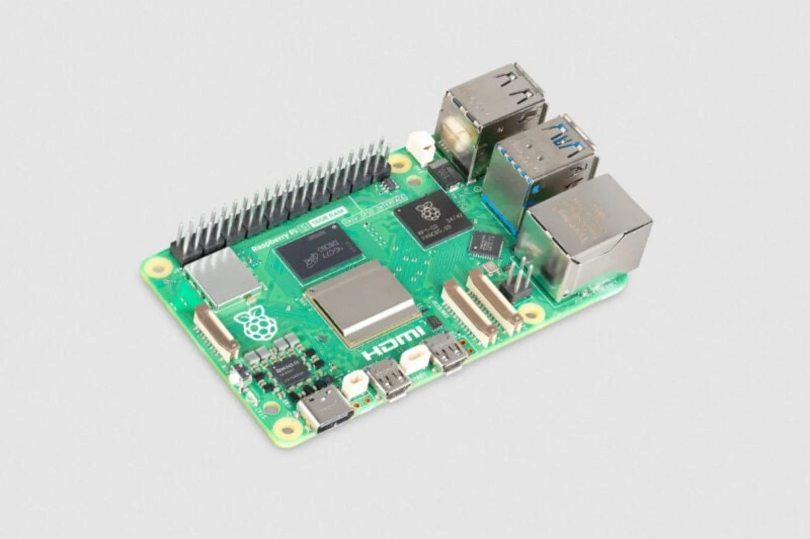Bo mạch đơn Raspberry Pi 5 Model B 16GB trên nền xám, đại diện cho máy tính mini đa năng.