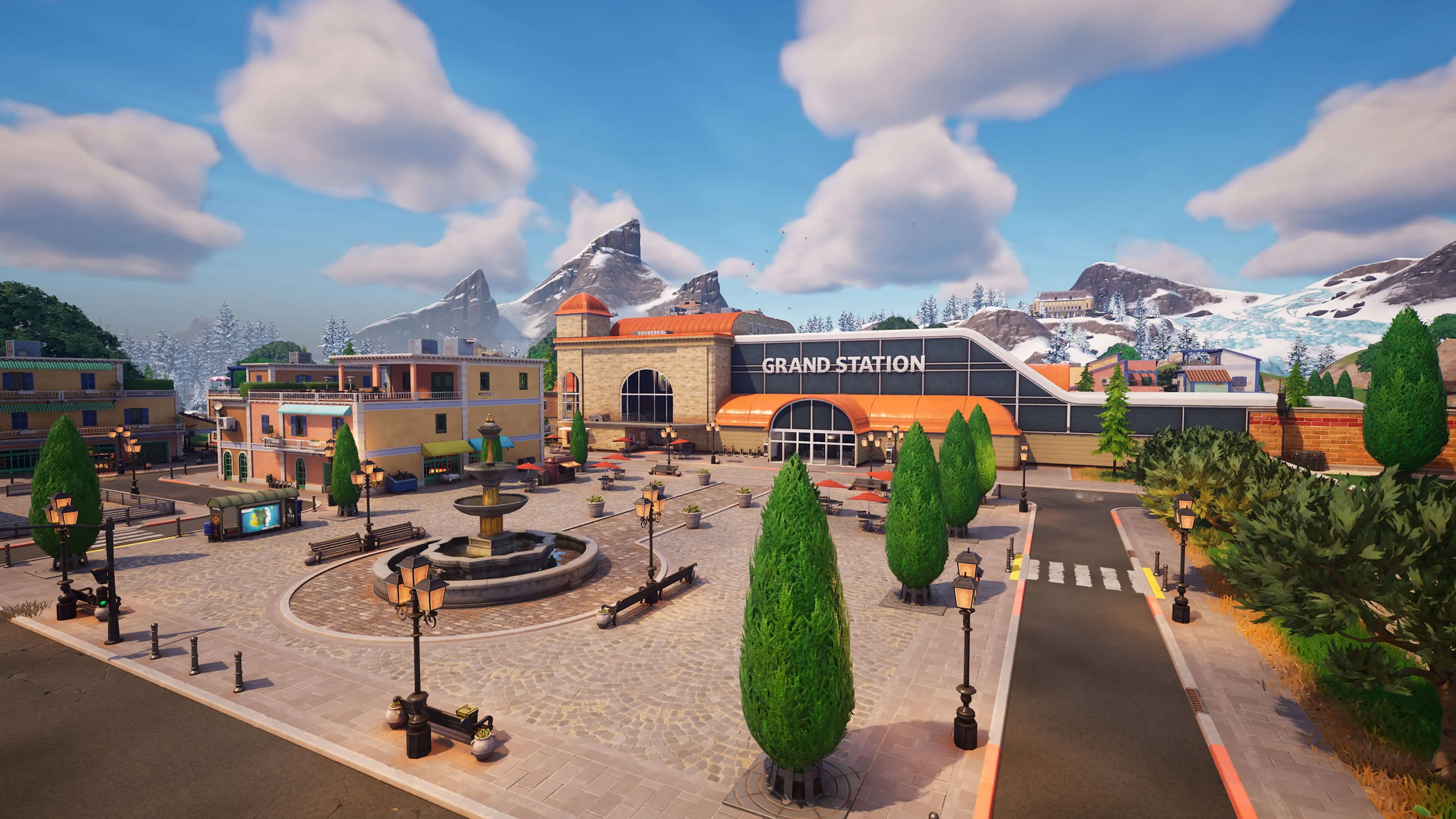 Ga Grand của Fortnite, một quảng trường mở với cây cối, tòa nhà và đường sắt.