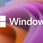 Logo Windows 11 và biểu tượng cập nhật, thể hiện việc Microsoft đang gỡ bỏ các rào cản để người dùng dễ dàng nâng cấp lên phiên bản 24H2.
