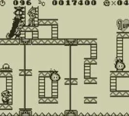 Mario leo thang và giải đố trong màn chơi của Donkey Kong trên Game Boy