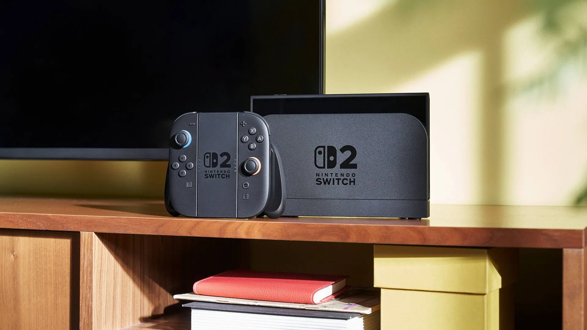 Máy Nintendo Switch 2 cùng Joy-Con được gắn vào dock, kết nối với TV ở chế độ chơi tại nhà.