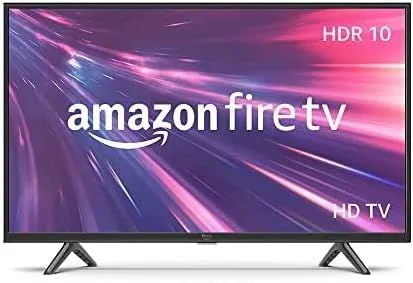 Smart TV Amazon Fire TV 32 inch với điều khiển giọng nói Alexa trên bàn.
